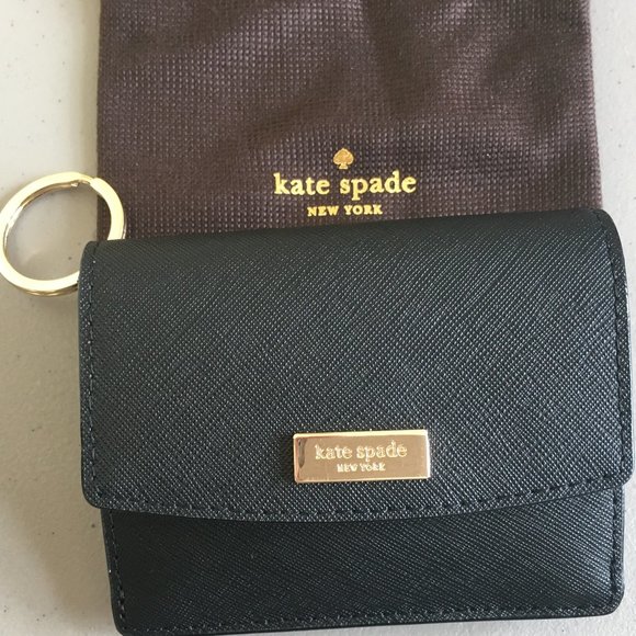 kate spade Handbags - NWT Kate Spade Laurel Way Petty Leather Wallet